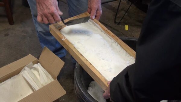 A class learning how to make sugar shims at Sustainable Honeybee Program